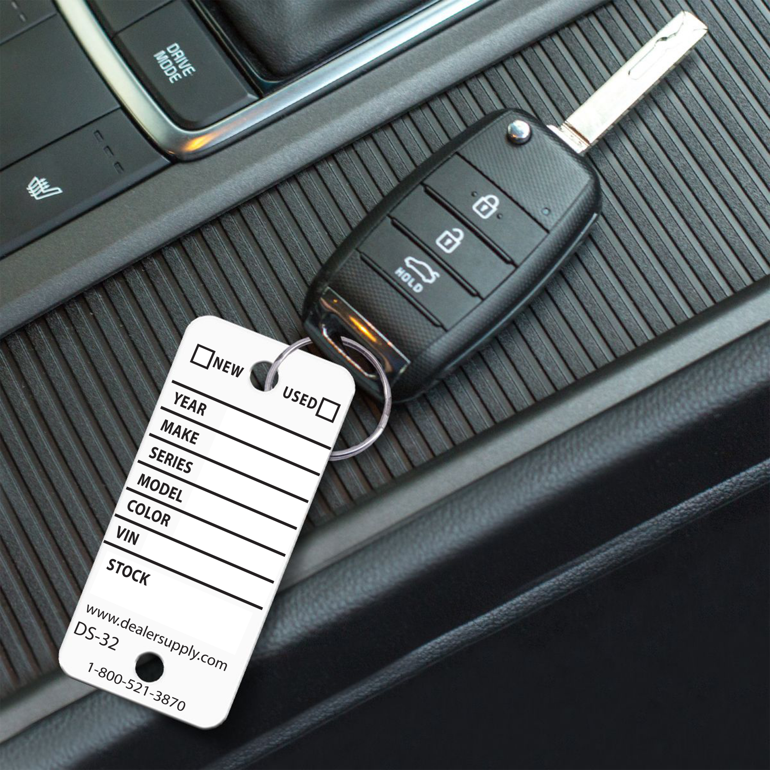 White Waterproof Rigid Vinyl Key Tag on Dealership Key Fob